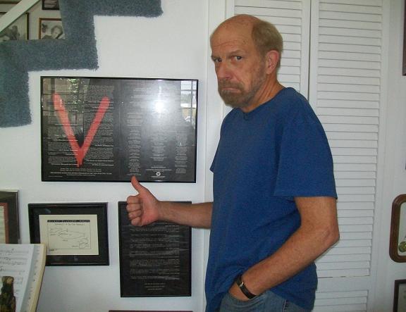 Kenny Johnson with original V artwork