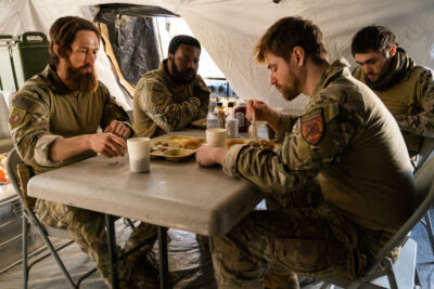 Debris S1x11 Bryan with his team in Afghanistan