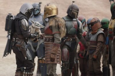 The Mandalorian S3 Din and Din Grogu with the Armorer and gang