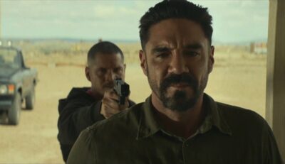 Mayans MC S5x06 Ez aims at Angel like he is going to kill him before going into the cabin