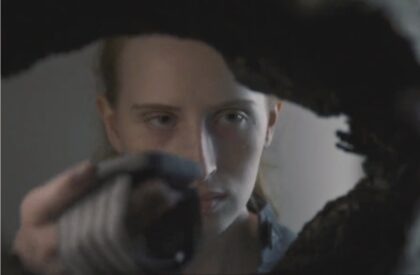 The Ark S2x06 Kelly gives the hand device to William Trust