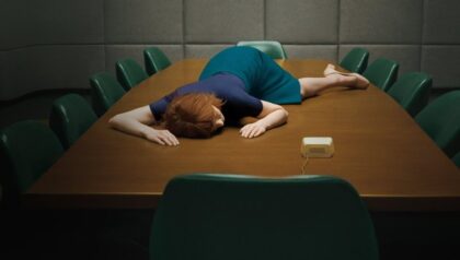 Severance S1x01 Helly R desposited in boardroom