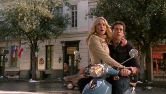 Chuck versus Honeymooners -Sarah and Chuck handcuffed on scooter