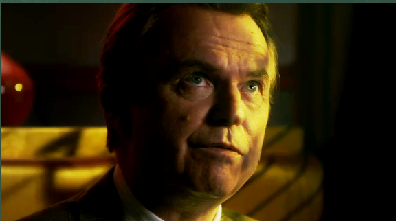 Happy Town - Sam Neill as Merritt Grieves "Shopkeeper"