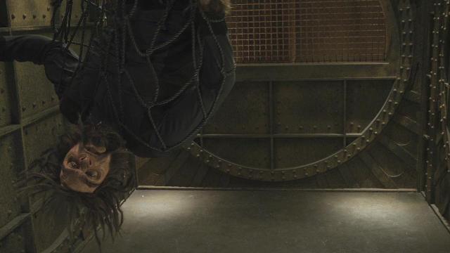 Sanctuary S3x12 Biggie hanging upside down in elevator