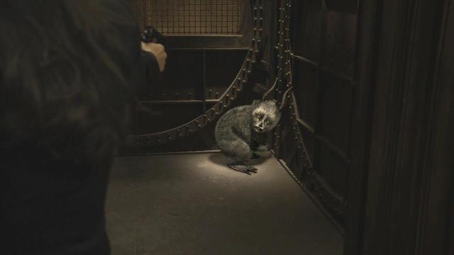 Sanctuary S3x12 Mollox cowering in elevator