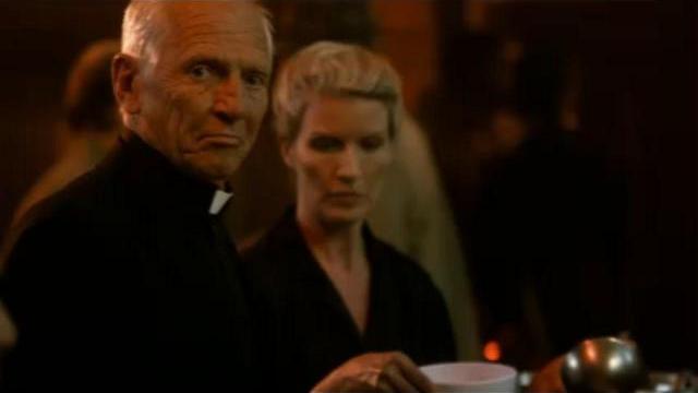 Scott Hylands as Father Travis from Red Rain