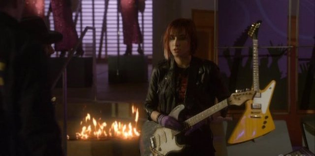 Warehouse 13 S3x01 Claudia caught with Hendrix guitar