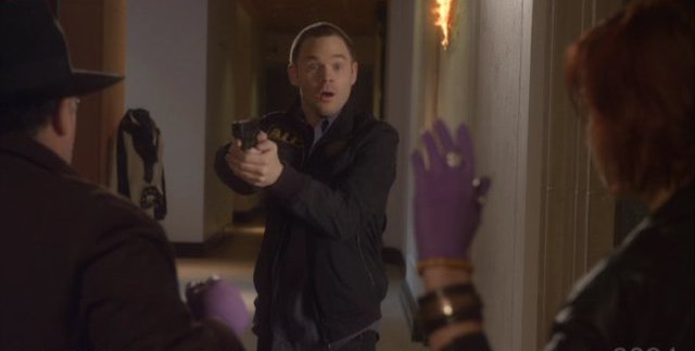 Warehouse 13 S3x01 Jinks holds them at gun point